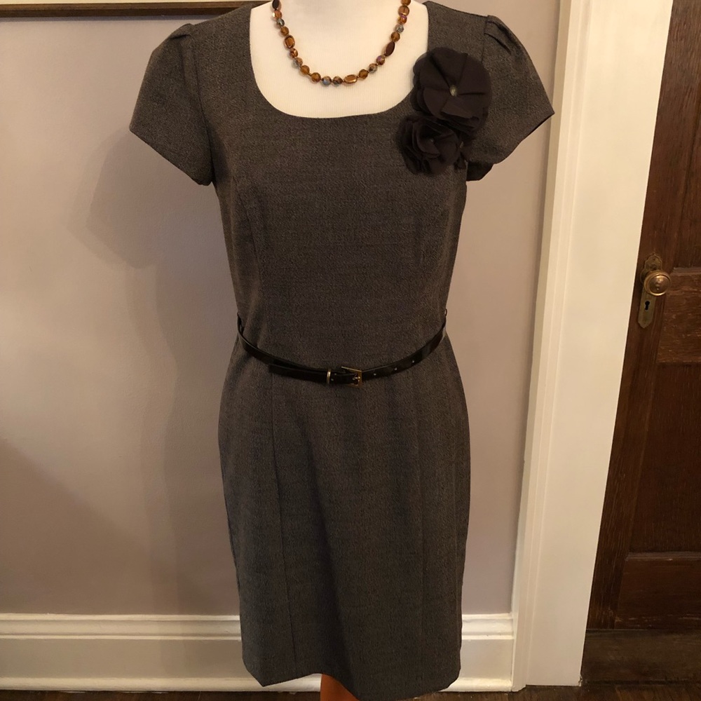 Sweet fully lined dress- belt with flower detail.